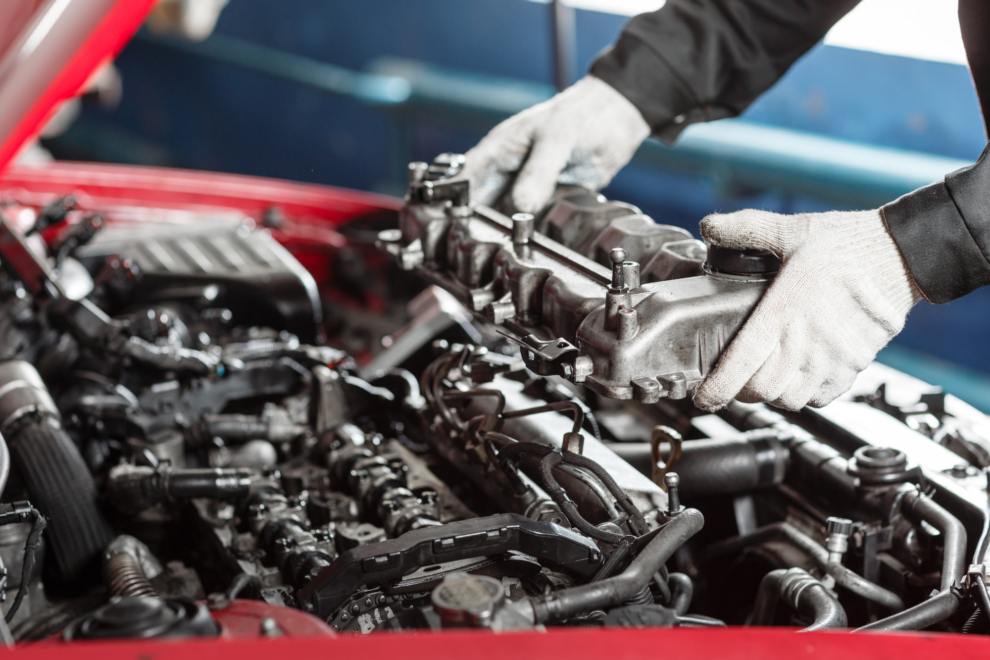 man working on diesel engine