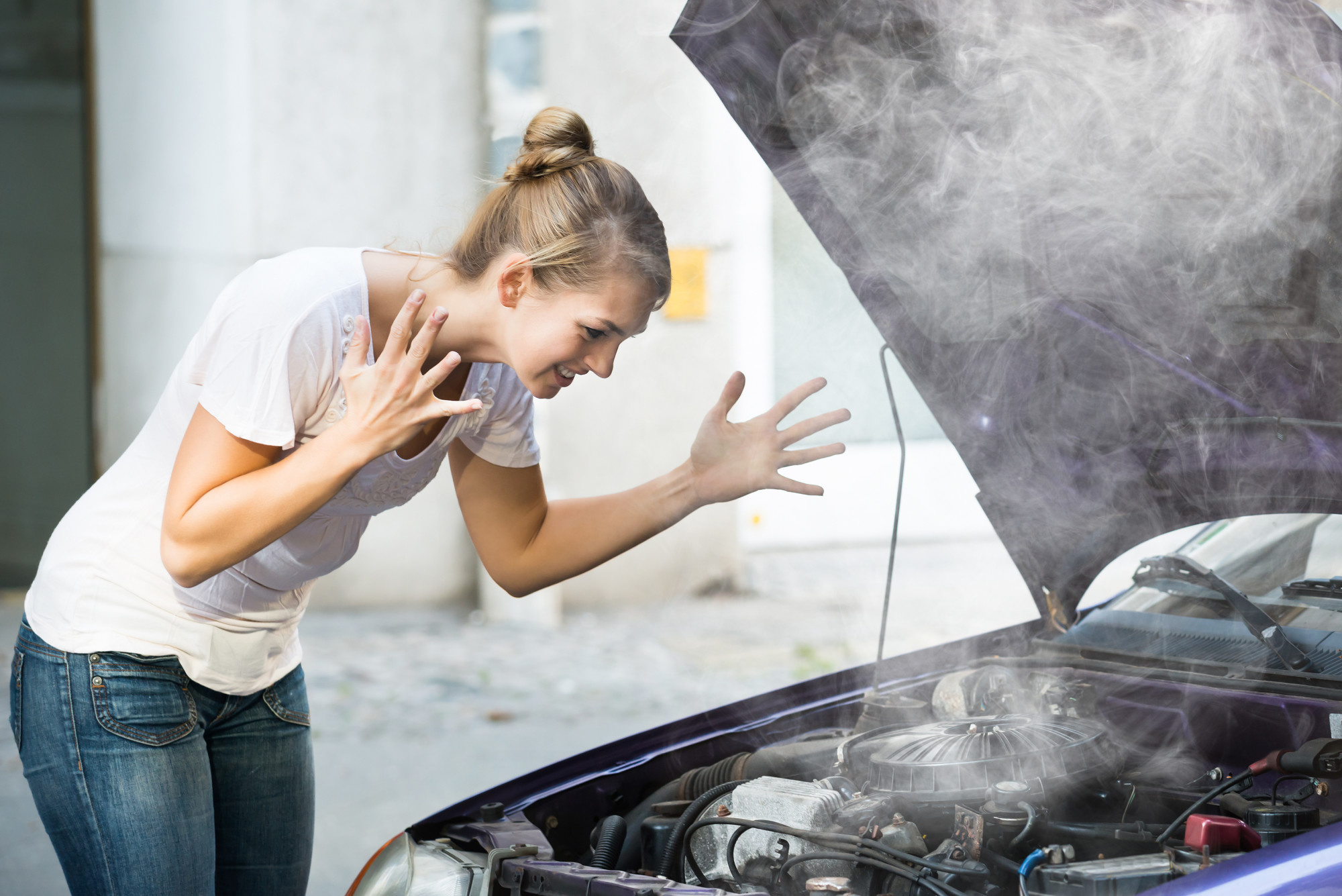 Woman With Car Engine Problem
